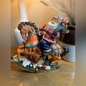 Festive Santa on Rocking Horse Figurine. Christmas decor Santa